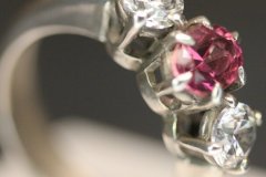Sterling Silver ring with coated pink Topaz and Cubic Zirconia.  
